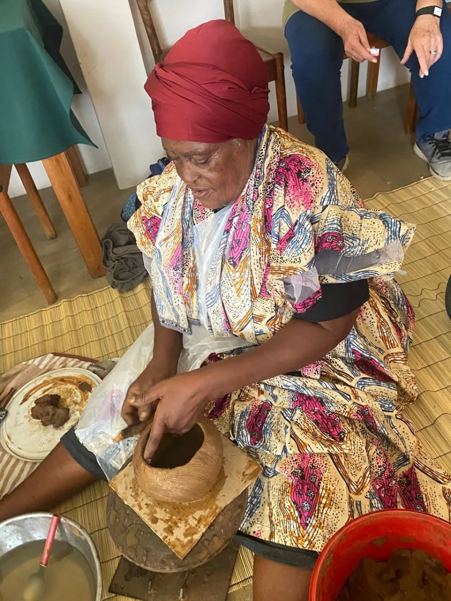 Buzephi Magwaza demonstrating traditional hand-built pottery